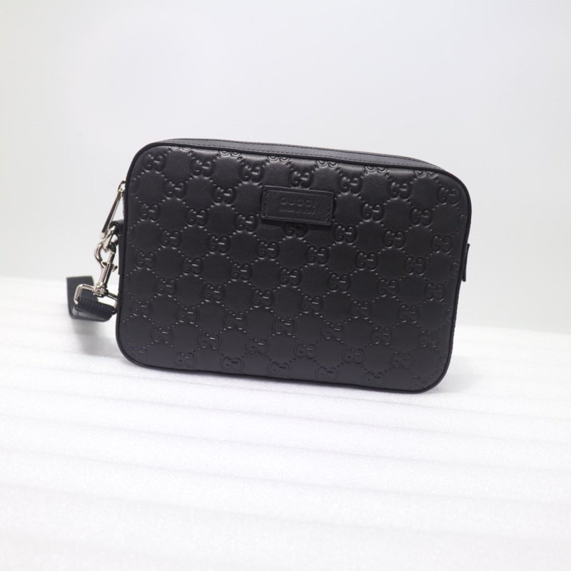 G*u*i clutch bags